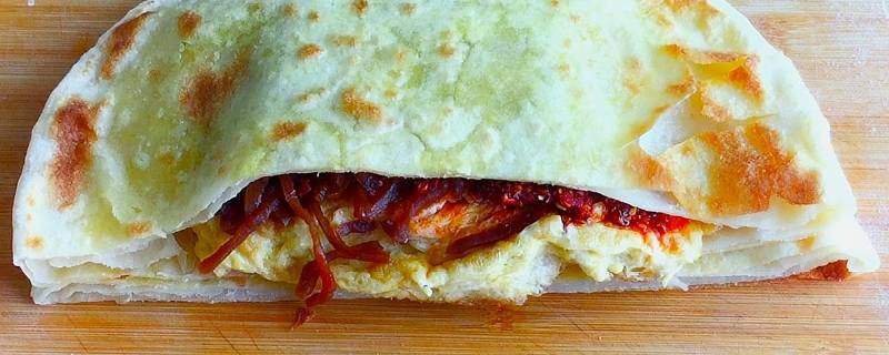 大饼鸡蛋里的咸菜叫什么（煎饼里放的咸菜叫什么名字）